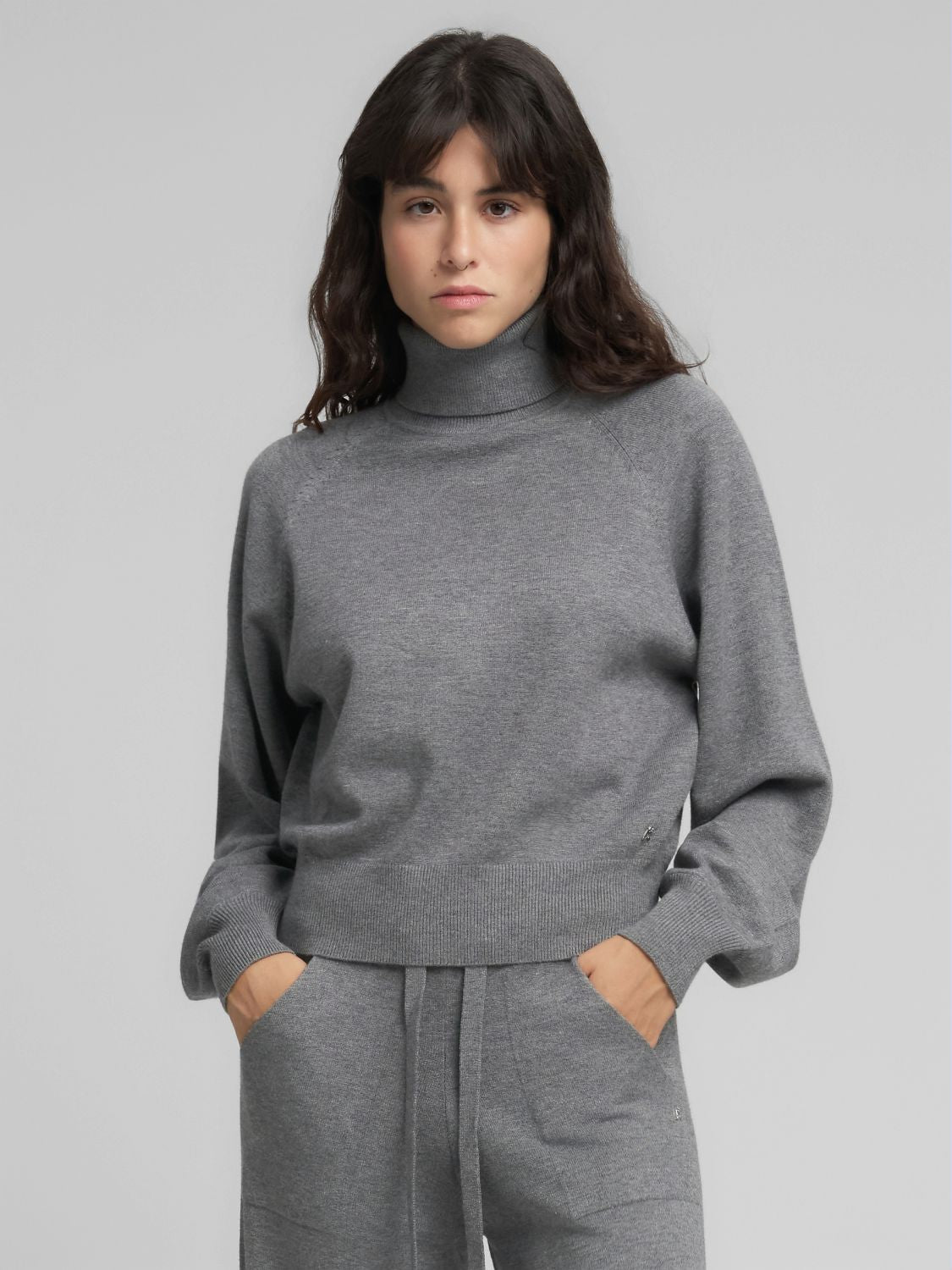 Dámský rolák s volnějšími rukávy