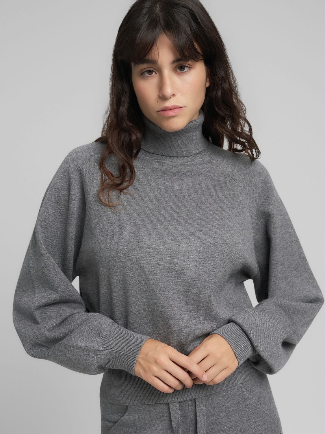 Dámský rolák s volnějšími rukávy