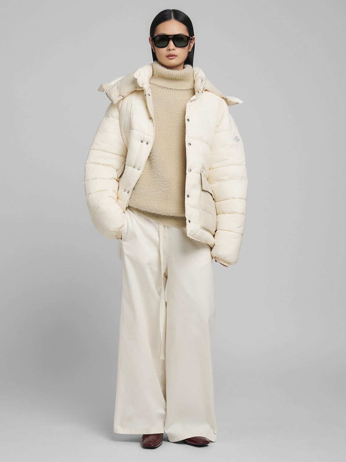 Chlupatý svetr bez rukávů