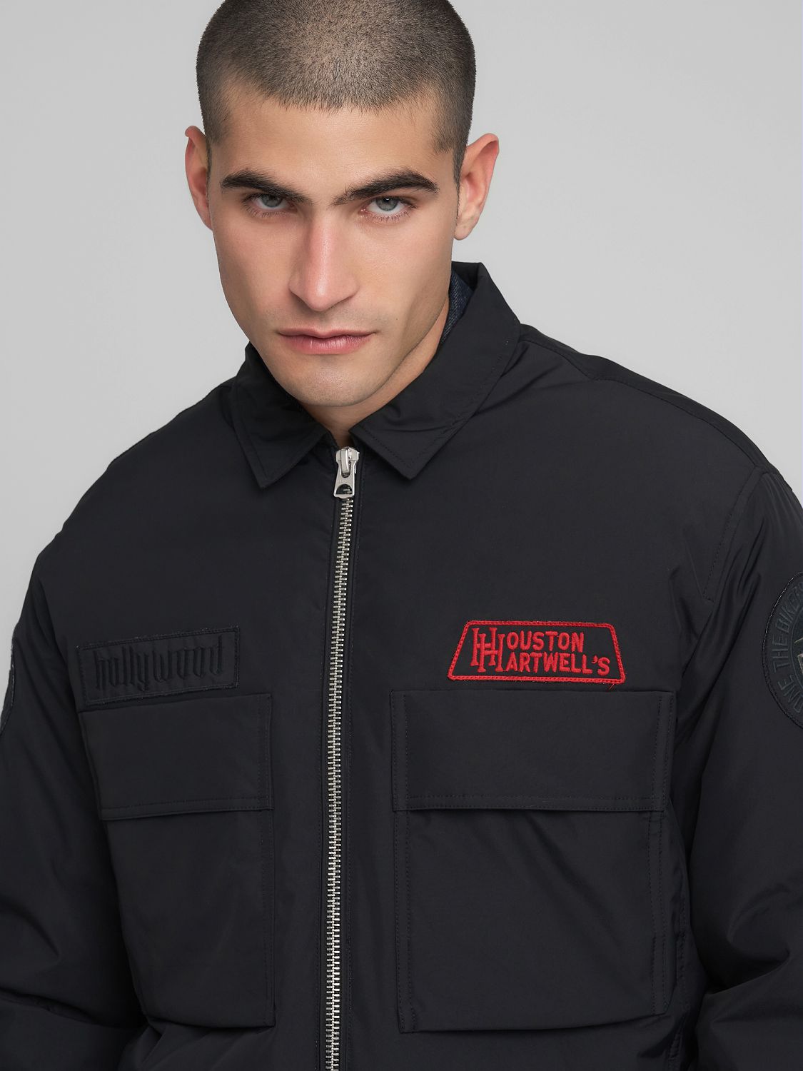 Prošívaná bunda s nášivkou