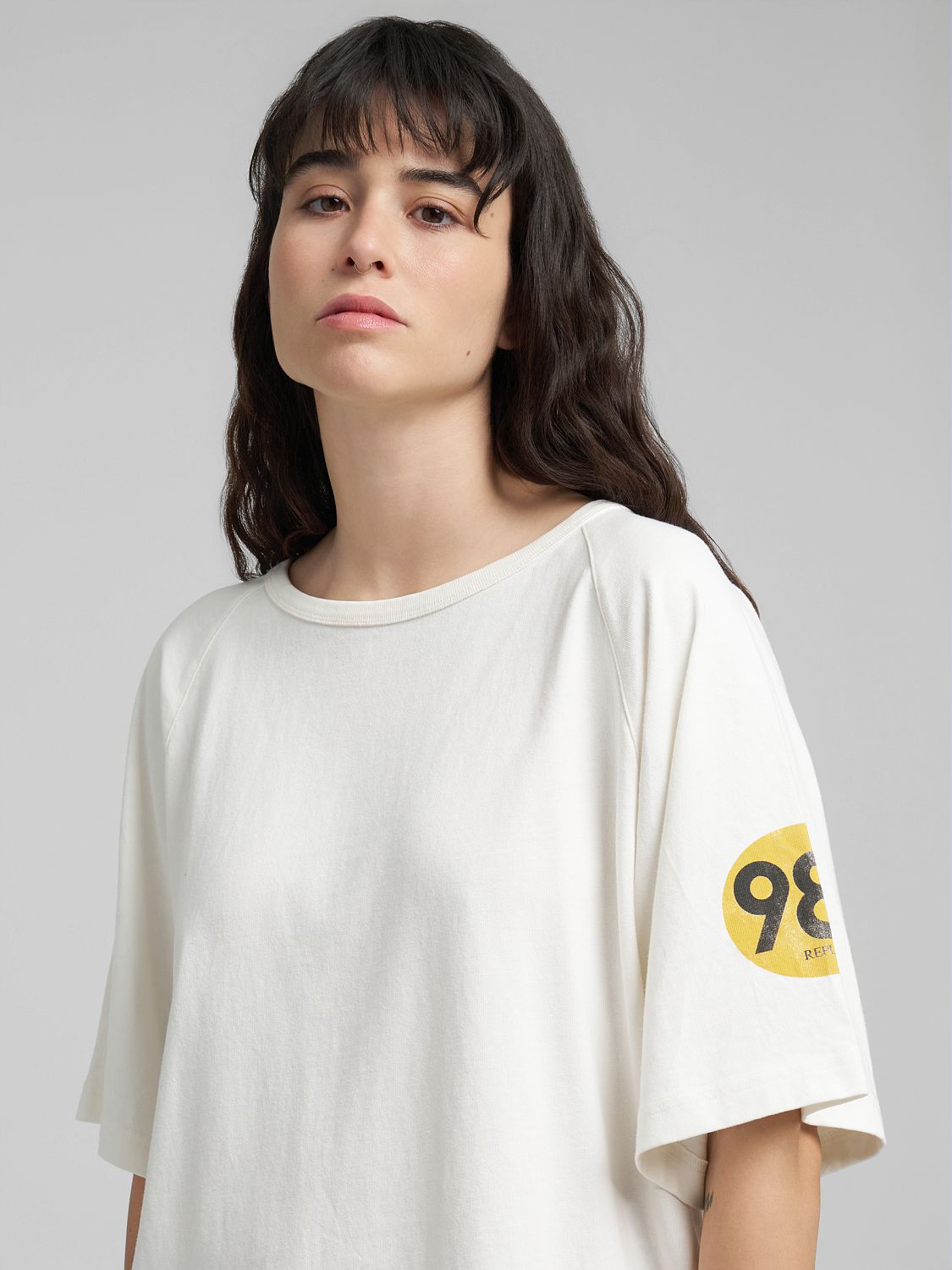 Dámské oversized tričko s potiskem na rukávu