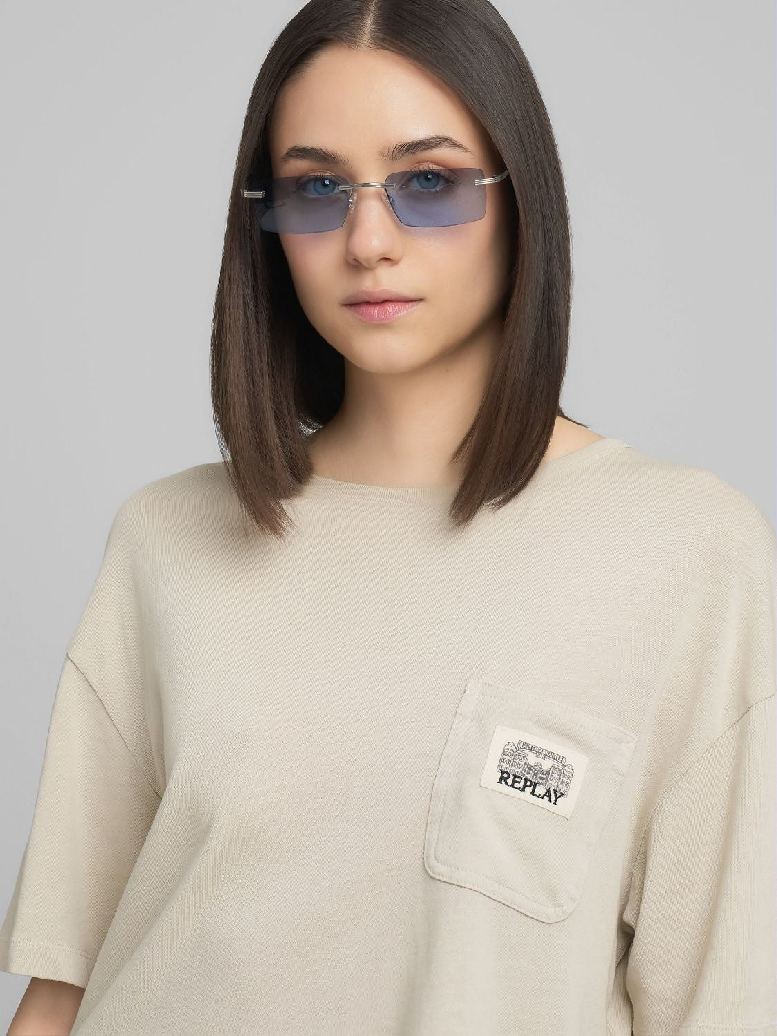 Cropped tričko s kapsou na prsou