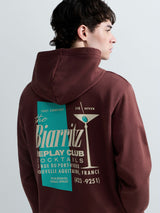 PÁNSKÁ MIKINA S KAPUCÍ A POTISKEM "THE BIARRITZ REPLAY CLUB" NA ZÁDECH