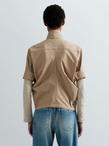 DÁMSKÁ BUNDA S KRÁTKÝM RUKÁVEM A KAPSAMI